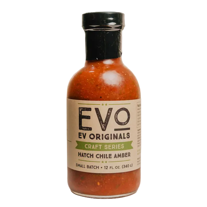 Bottle of Evo Originals Hatch Chile Amber sauce on a white background